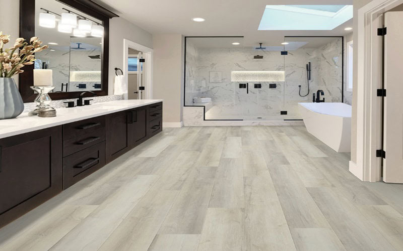 Cloudless Oak Luxury Vinyl Planks by Inception - Metroflor In A Bathroom Setting